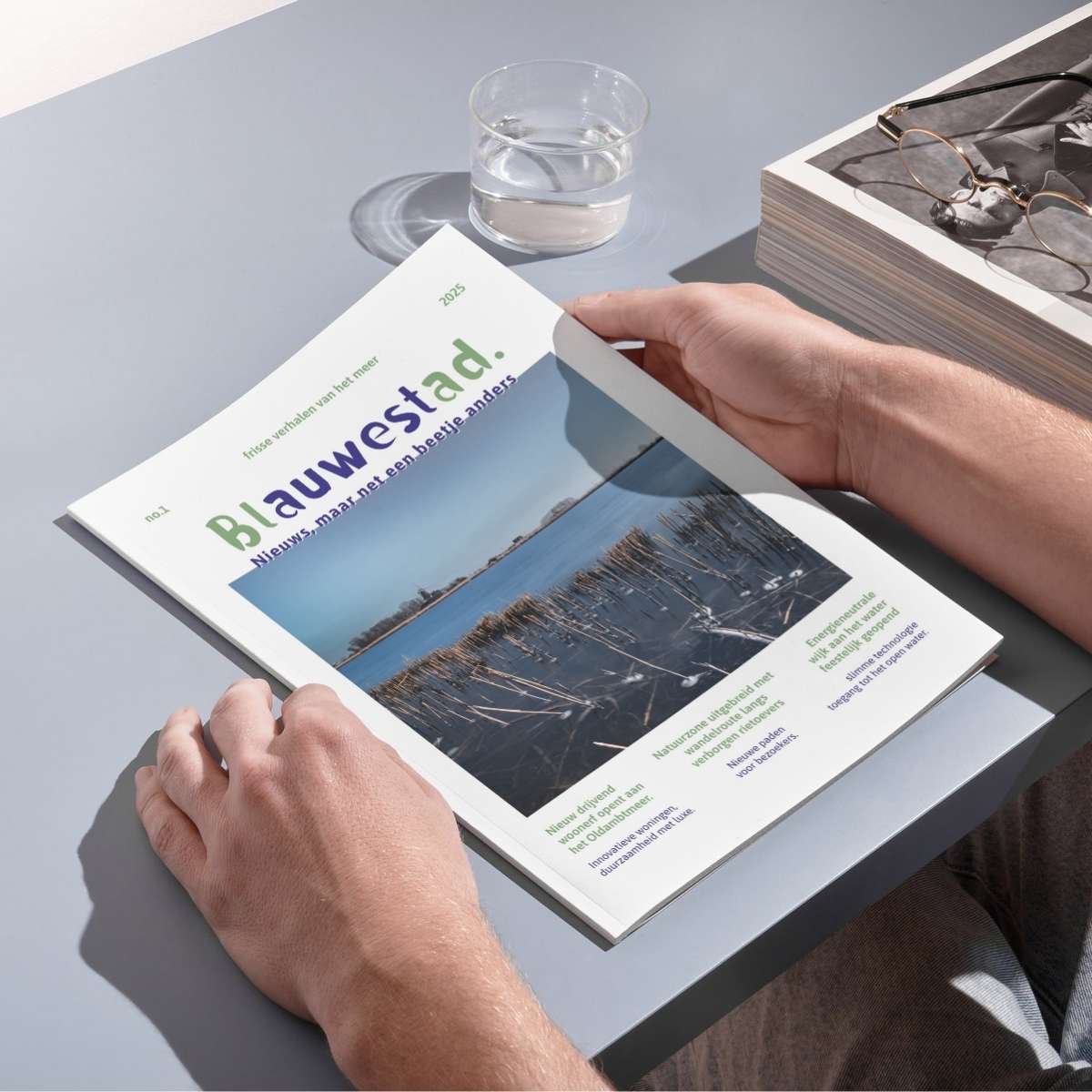 Headmast ontwerp voor Blauwestadblad, krantenkop en visuele identiteit ontworpen door grafisch vormgever uit Groningen.